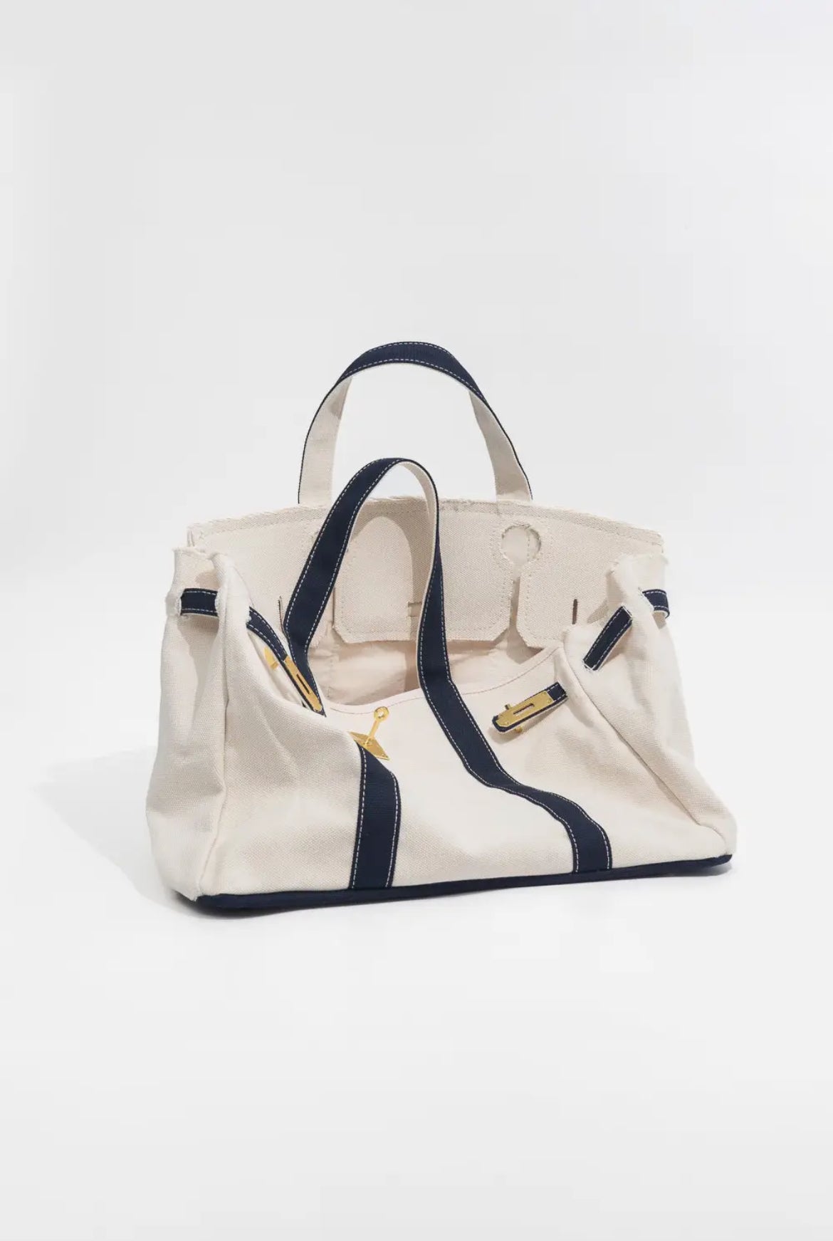 Hand Crafted Premium Cotton Canvas with luxury steel  headwear bag.