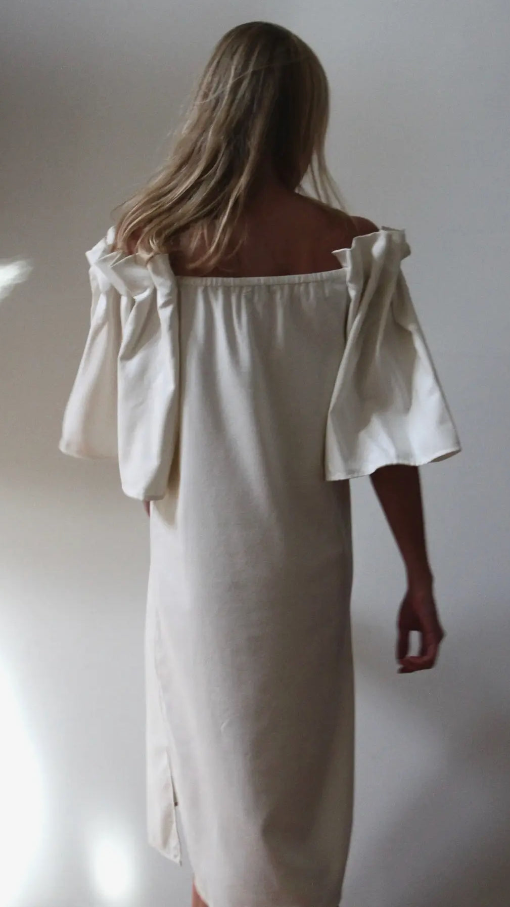The romantic Vintage Inspired silk canvas dress with dramatic bell sleeves.
